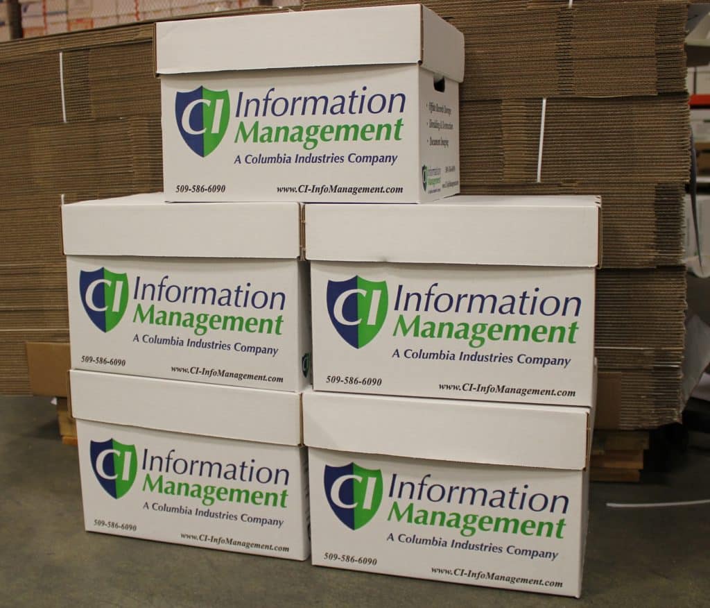 Five CI Information Management Record Storage Boxes stacked.