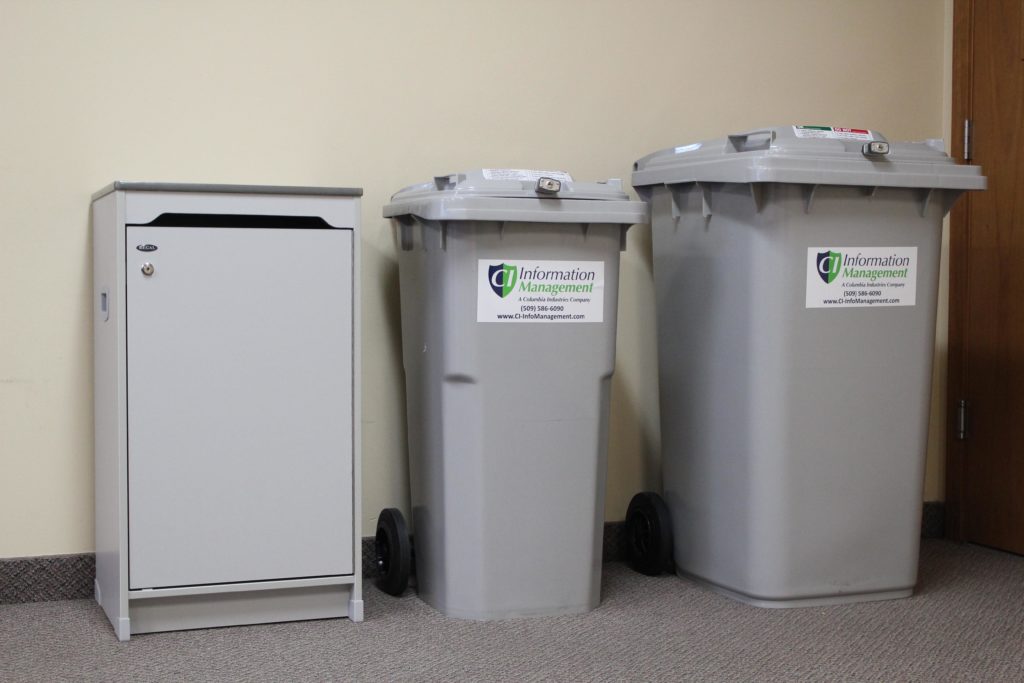 Three different collection containers that CI Information Management supplies to their clients.