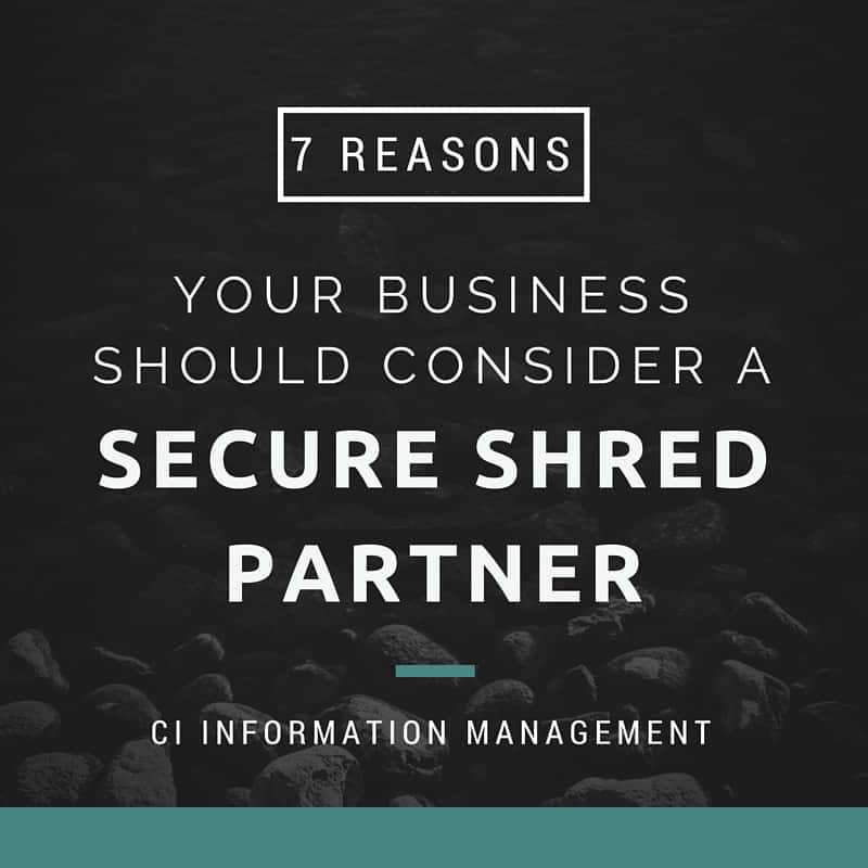 "Seven Reasons Your Business Should Consider A Secure Shred Partner" Text against a grey background.
