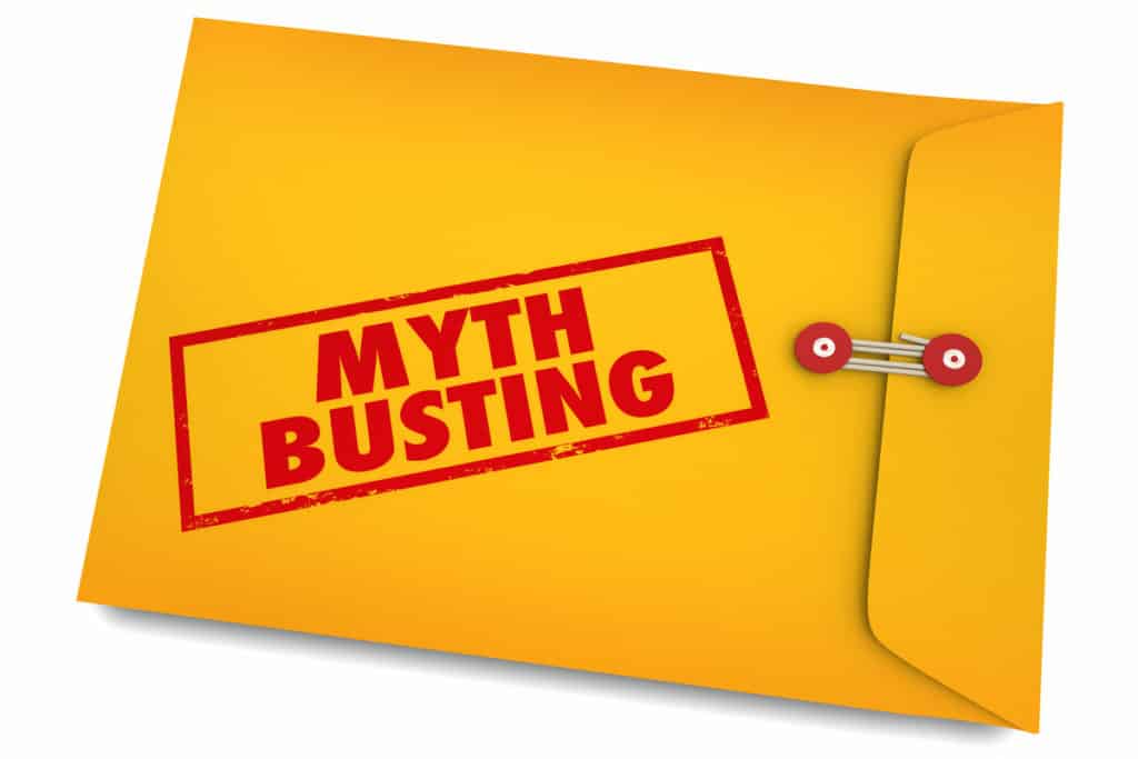 A manilla envelope with a bold red stamp that reads "Myth Busting"